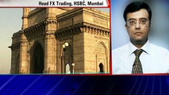 Currency cues: Dollar gains