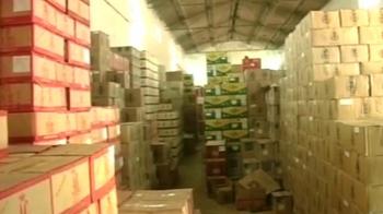 Govt godown stores liquor, wheat rots on roads