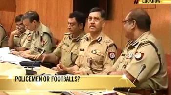 UP: Policemen or footballs?