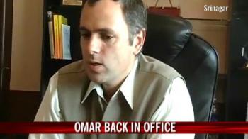 Omar back in office