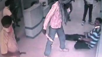 Video : Masks, guns and CCTV at bank robbery