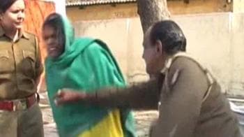Video : Cop fired for beating Dalit woman