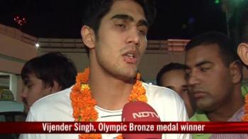 Indian boxing heroes return home