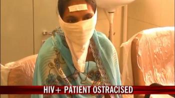 HIV+ sticker on patient's forehead