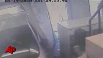 Van crashes into laundromat